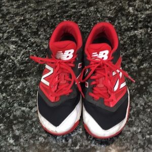 New balance red baseball trainers